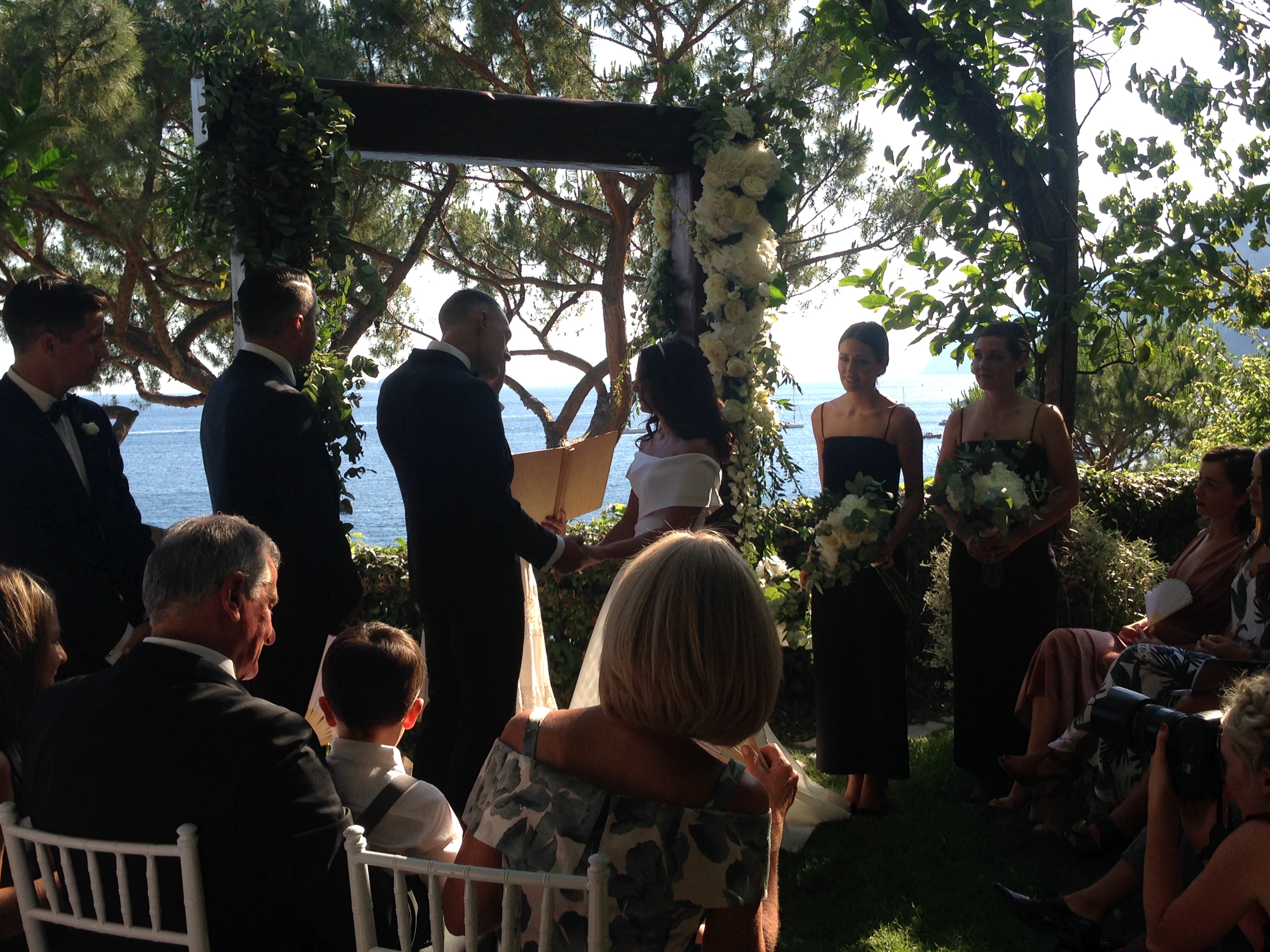 https://www.weddingamalfi.com/wp-content/uploads/Laura-and-Jarrod-seaside-wedding-ceremony.jpg